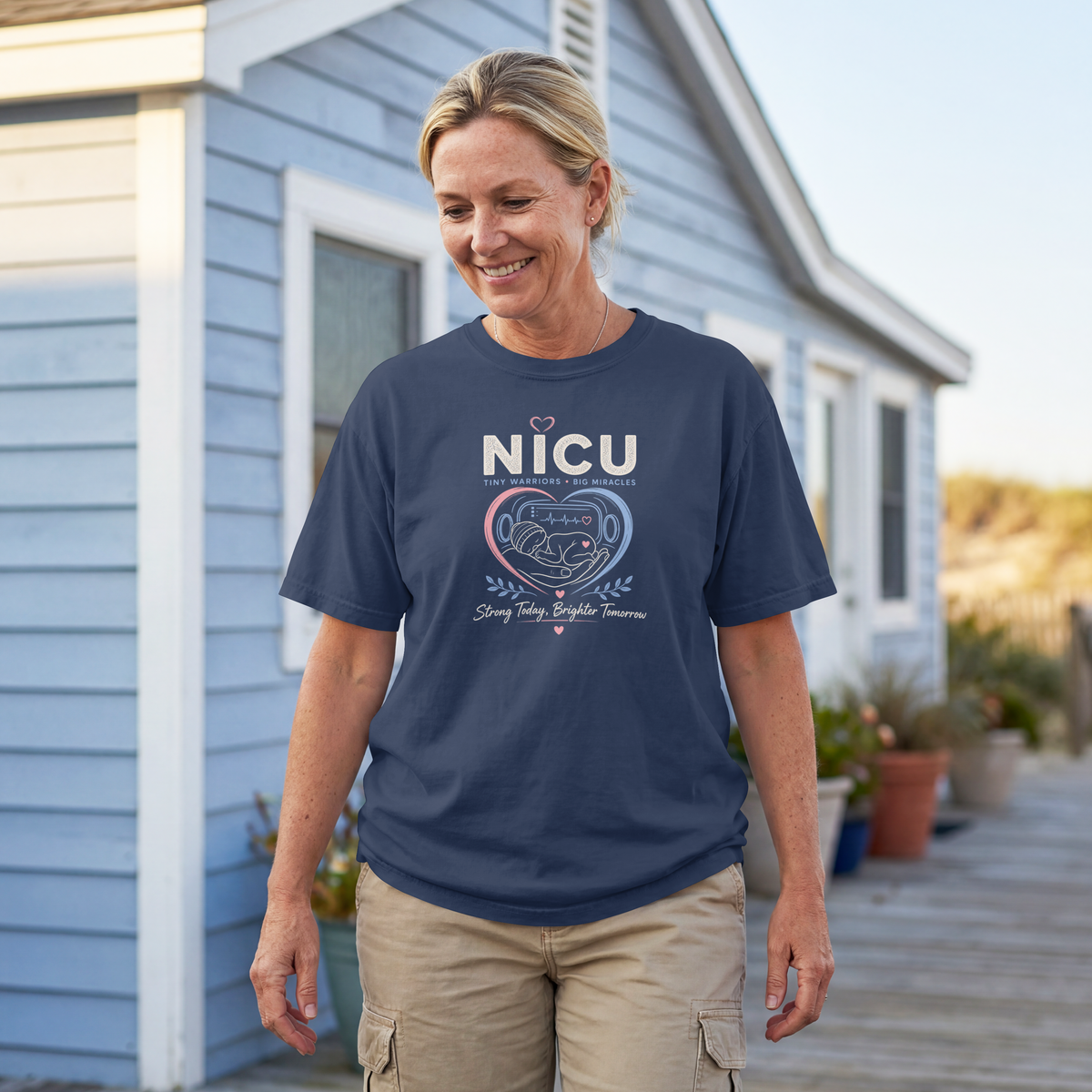 NICU Nurse Tiny Warriors Big Miracles tee, on-model three-quarter view