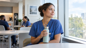 Nurse taking a quiet break in a hospital staff lounge