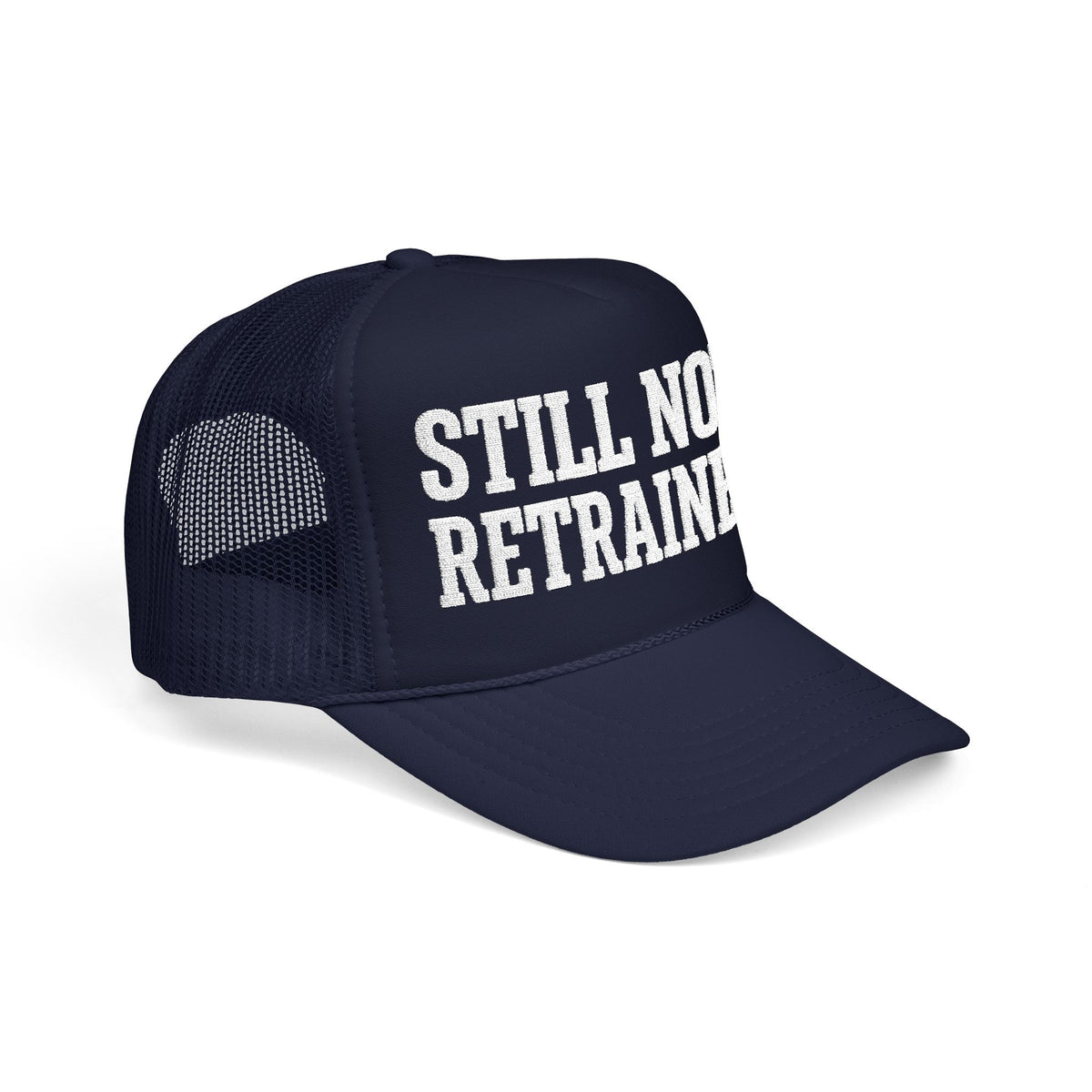 Dark navy Still Not Retrained foam trucker hat at three-quarter angle, mesh back panel and pre-curved visor visible.