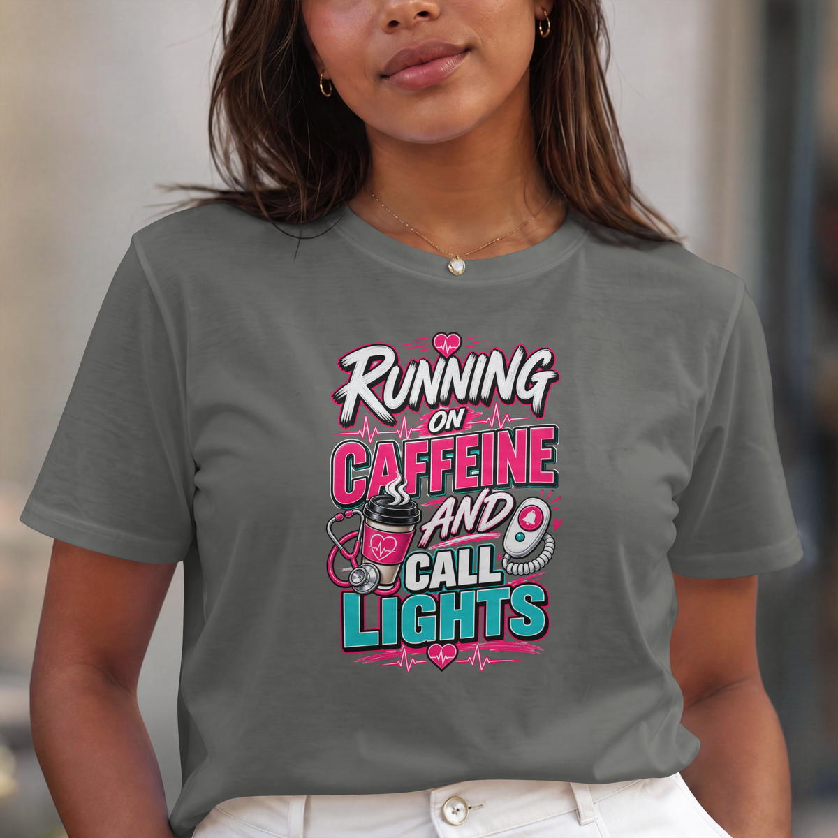Close-up of the Running on Caffeine and Call Lights print on a grey tee