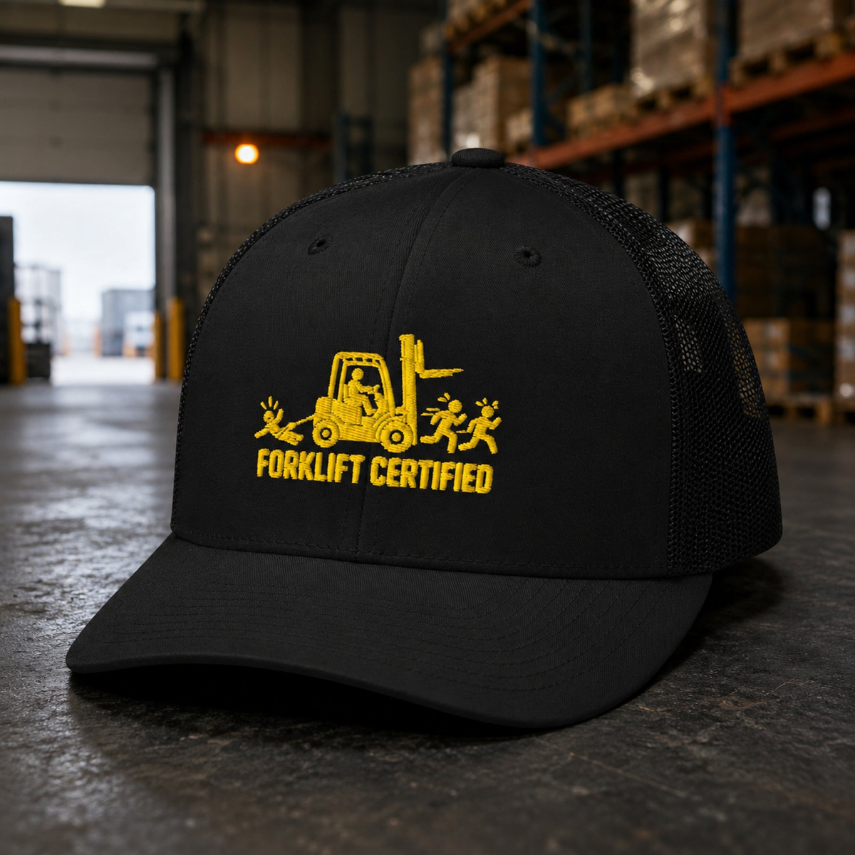 Forklift Certified black embroidered trucker hat displayed in a warehouse setting