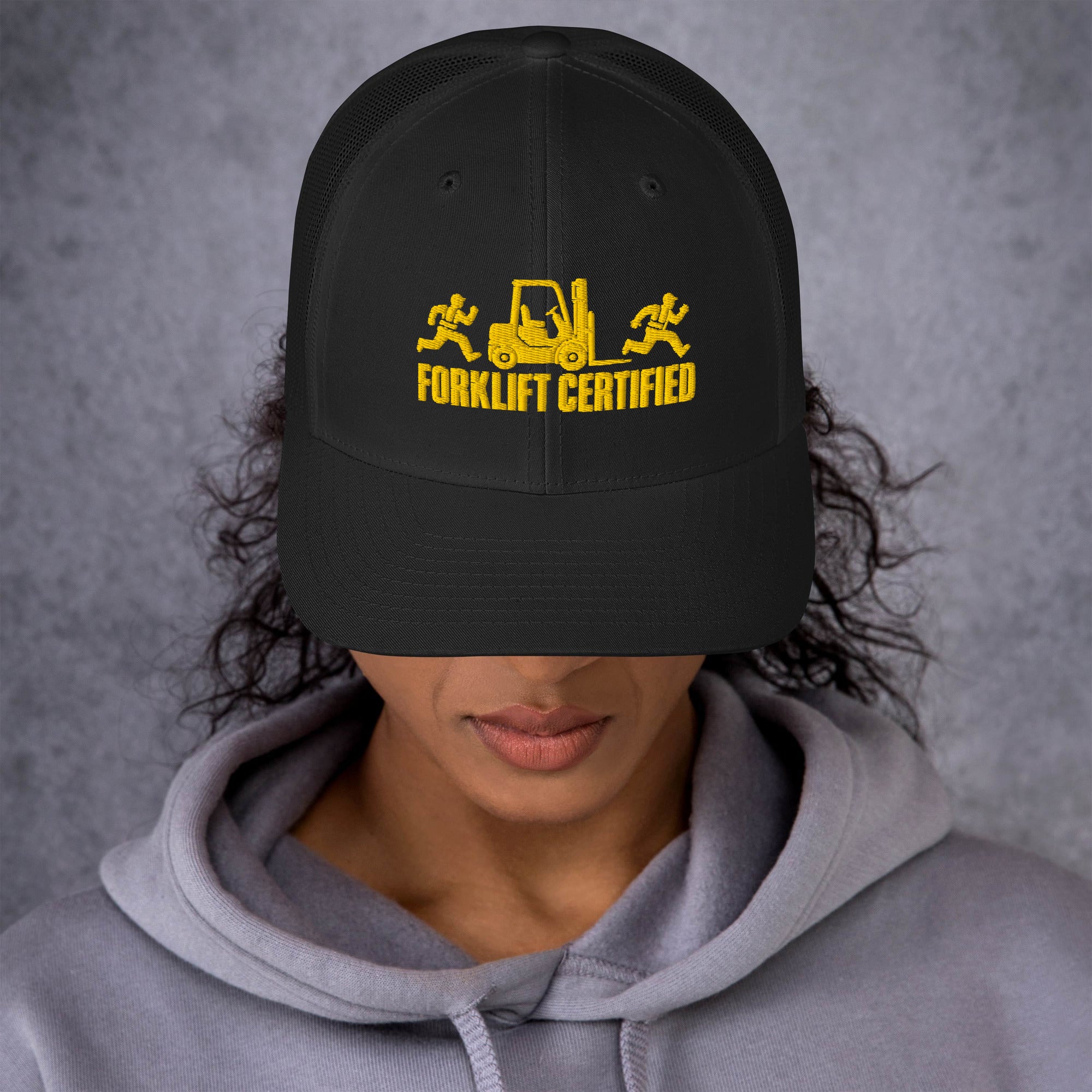 Forklift Certified funny trucker hat in black, front view of mesh-back cap