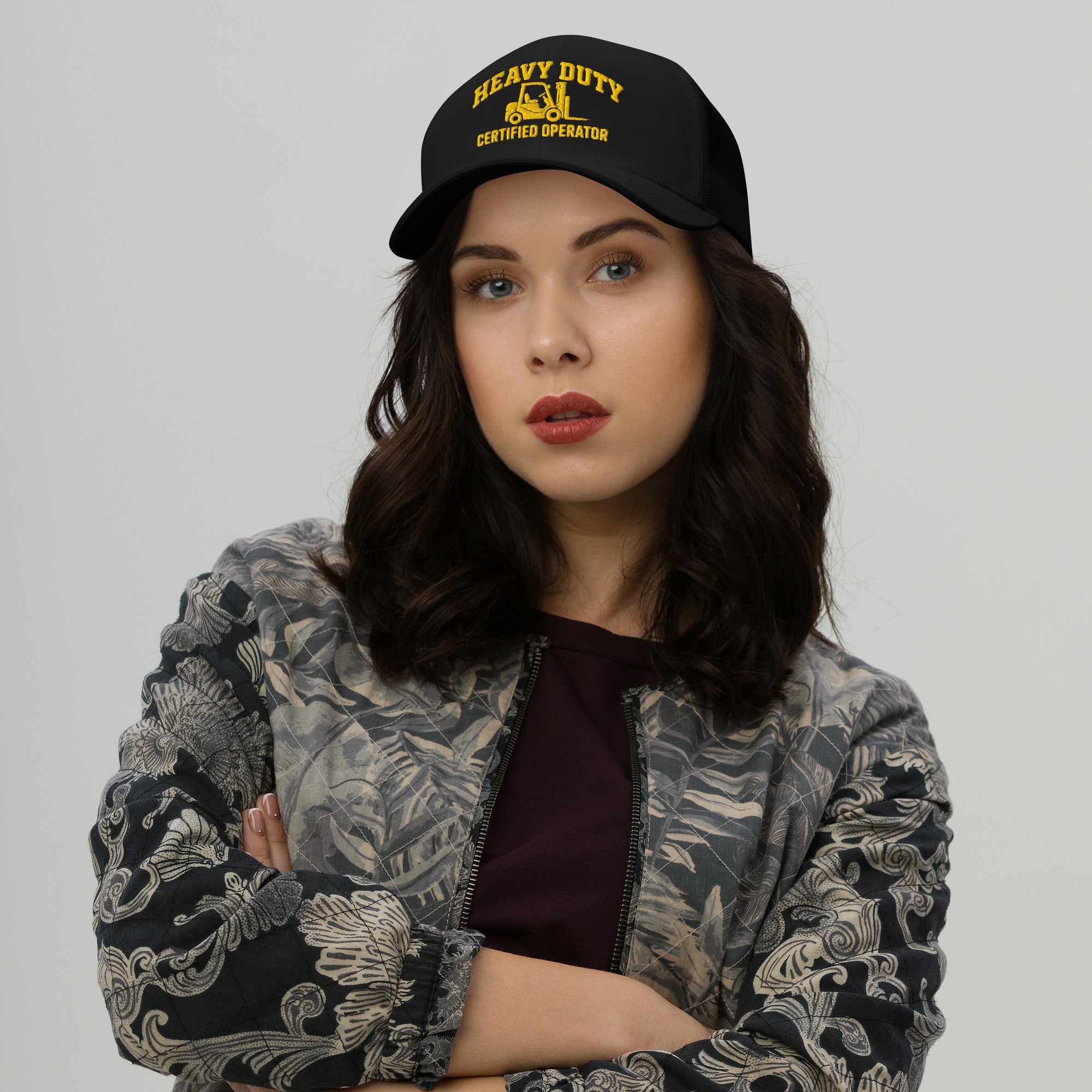 Heavy Duty Certified Operator embroidered trucker hat in black, front view