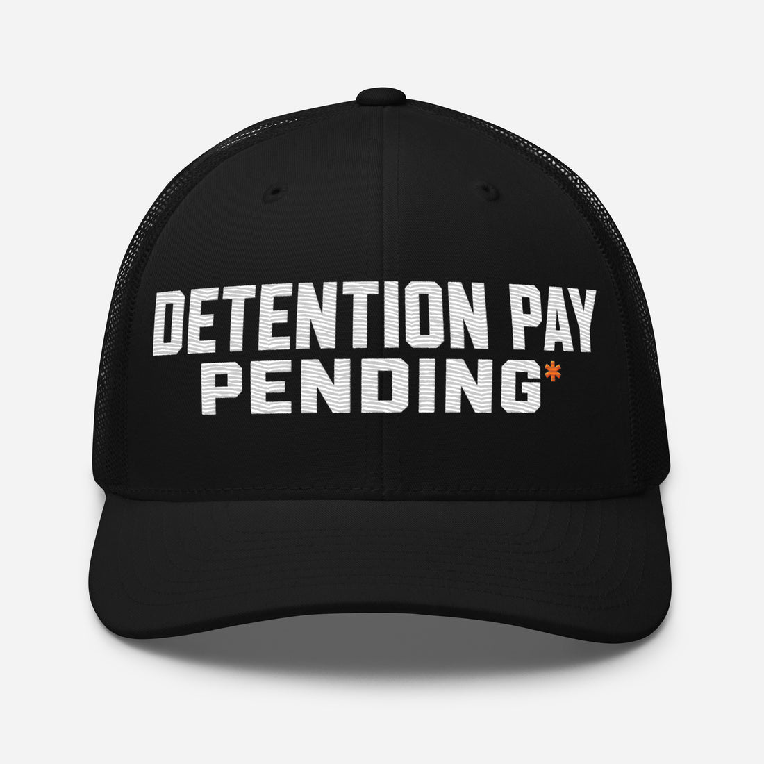 Detention Pay Pending embroidered trucker hat in black for truck drivers, front view