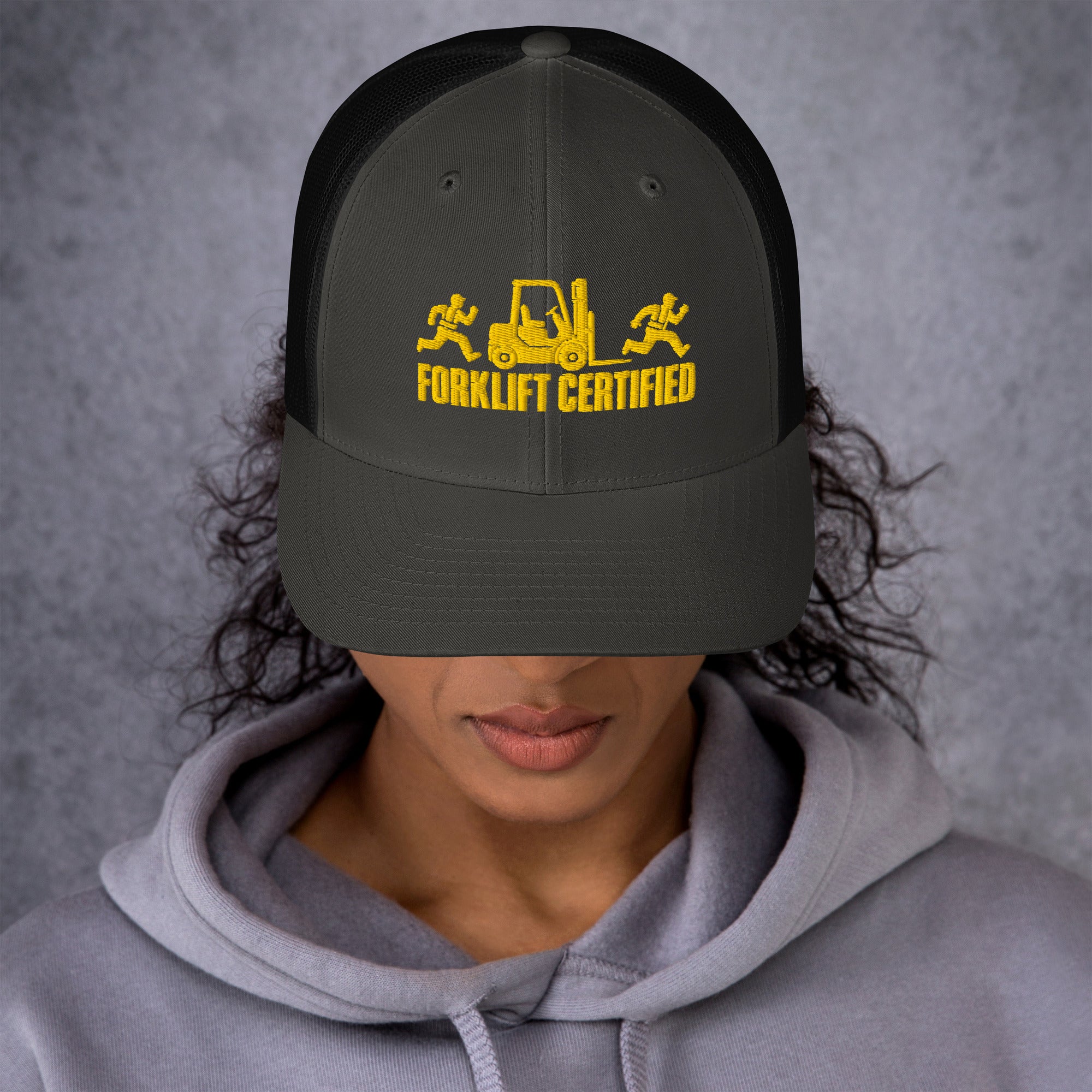 Forklift Certified trucker hat in charcoal and black, front view showing mesh back