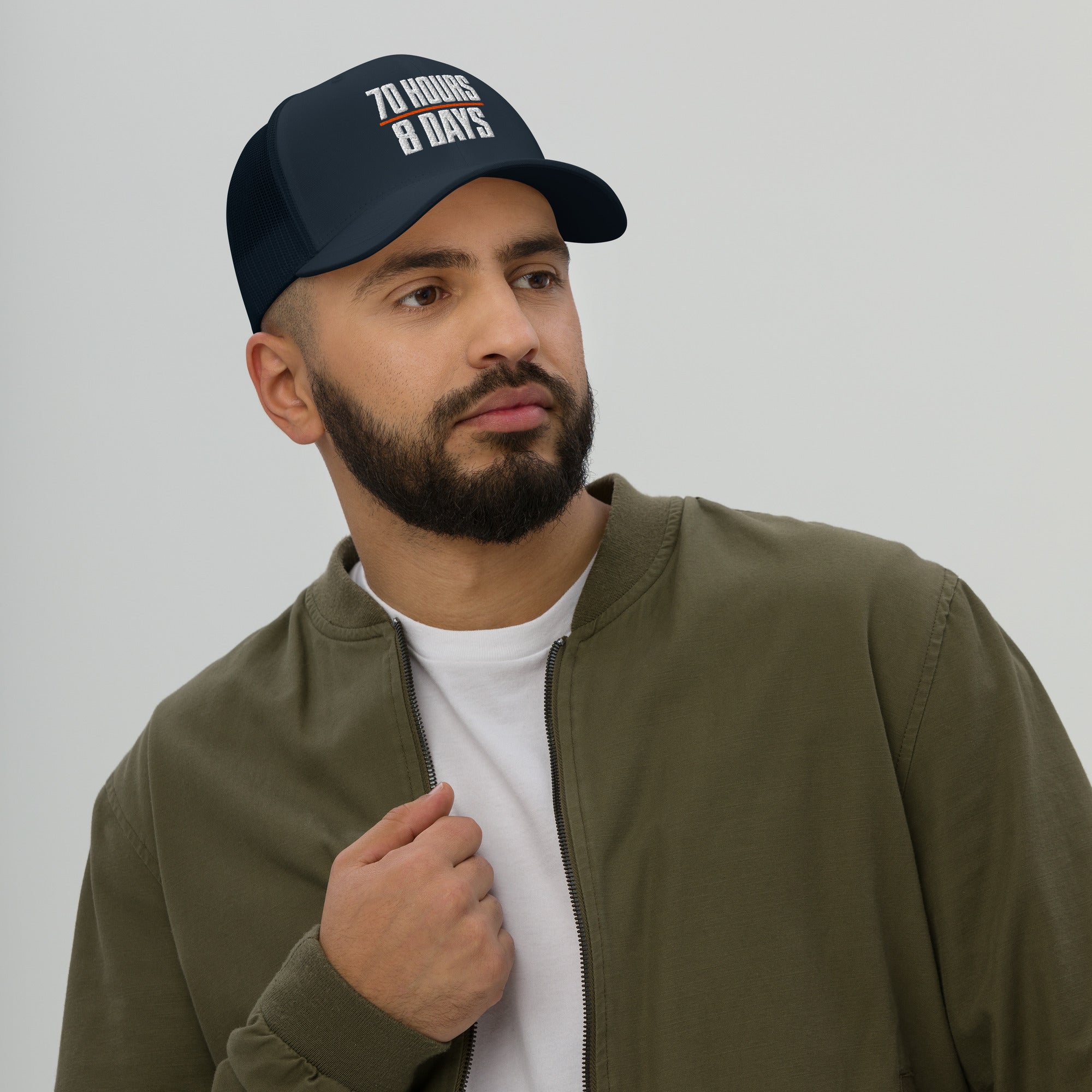 70 Hours in 8 Days embroidered trucker hat in navy for truck drivers, front view