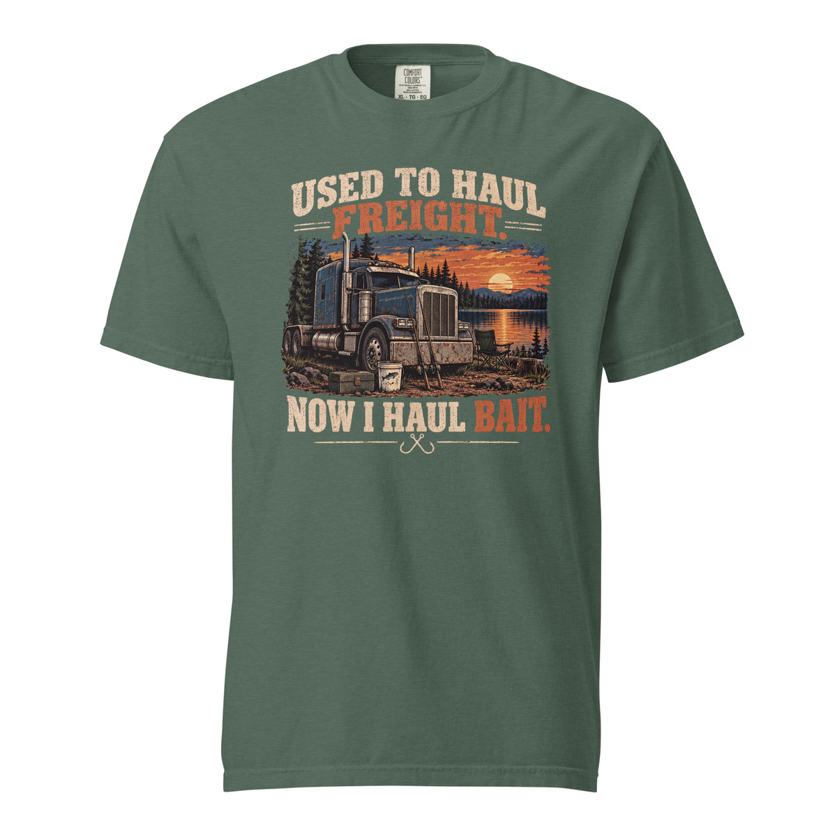 Blue Spruce retired trucker fishing T-shirt with blue semi-truck, lake sunset and Used to Haul Freight Now I Haul Bait slogan