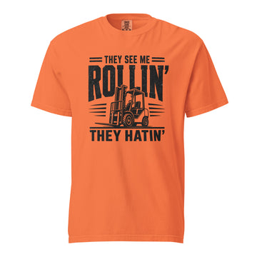 They See Me Rollin They Hatin forklift operator heavyweight T-shirt in burnt orange, front view