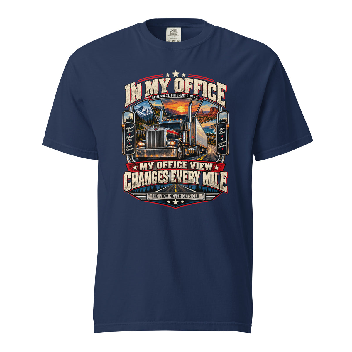 Navy blue semi truck graphic T-shirt with scenic mountains, highways, and My Office View Changes Every Mile design