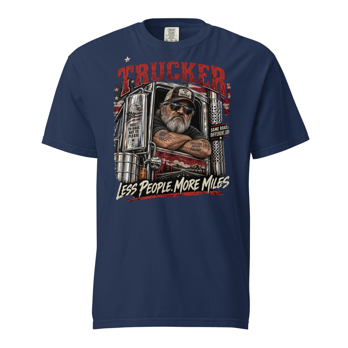 True Navy Comfort Colors 1717 Trucker Less People More Miles T-shirt featuring a bearded semi-truck driver, vintage American flag graphics, and rugged highway artwork.