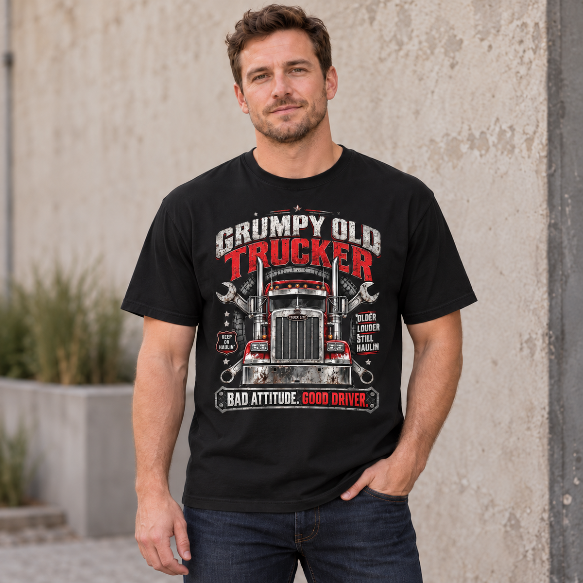 AI lifestyle mockup of a male model wearing a Black Grumpy Old Trucker T-shirt with a red semi-truck, crossed wrenches and Bad Attitude. Good Driver. front graphic.
