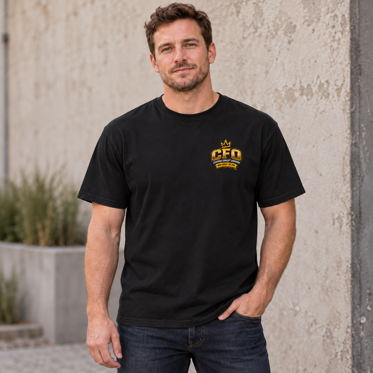 AI front lifestyle mockup of the Black CFO Certified Forklift Operator T-shirt worn by a model, showing the small left-chest badge and plain sleeves.