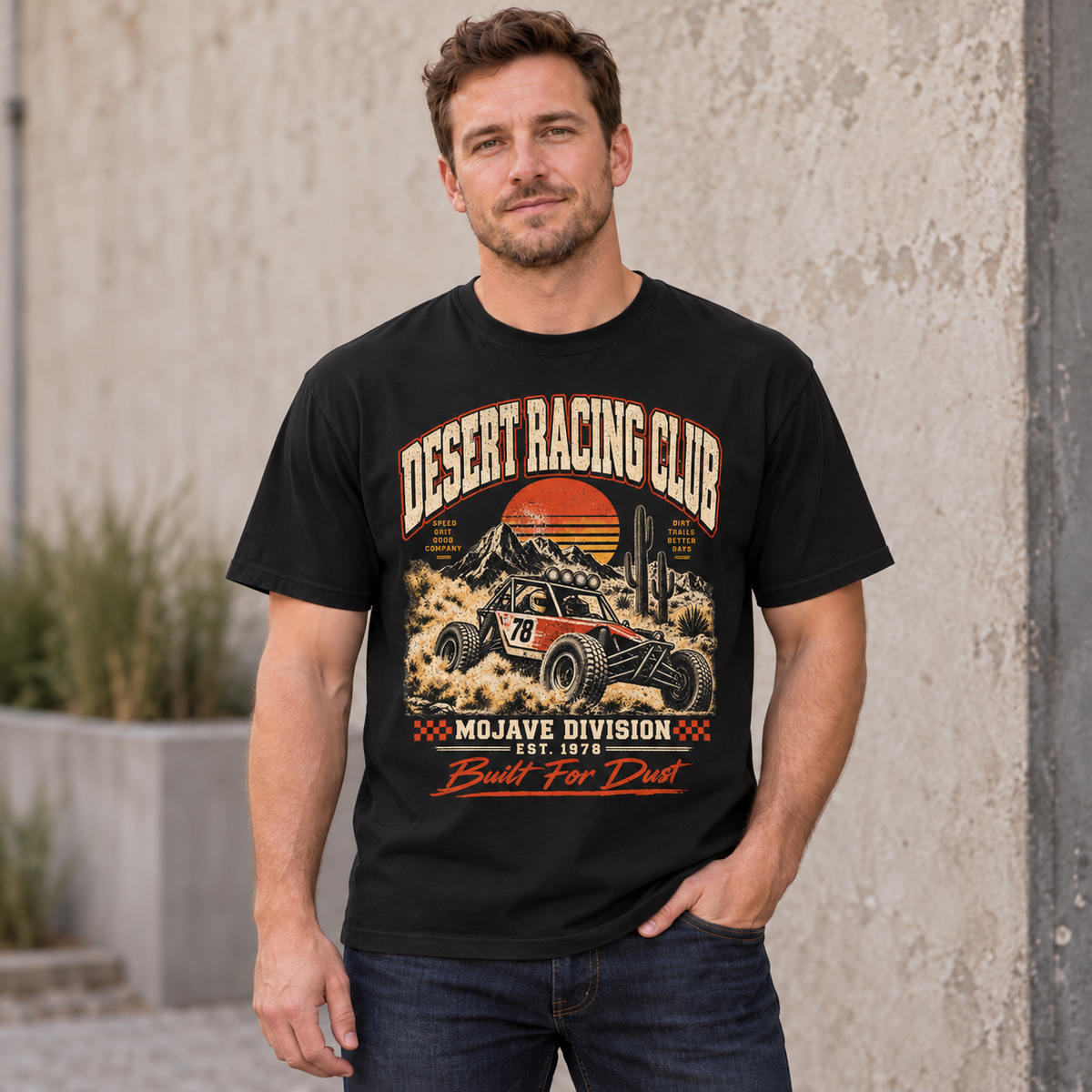 AI lifestyle mockup of the Black Desert Racing Club Mojave Division T-shirt worn by a model, showing the front graphic.