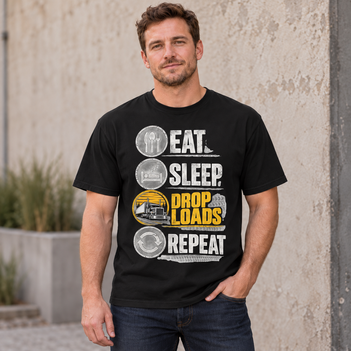AI lifestyle mockup of the Black Eat Sleep Drop Loads Repeat T-shirt worn by a model, showing the truck and stacked icon front graphic.