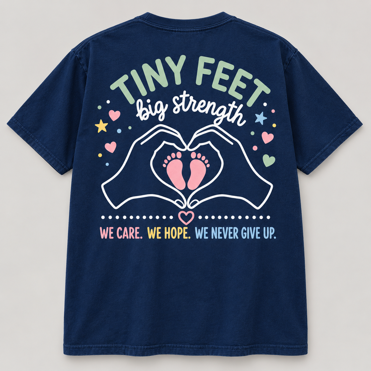Full back view of the True Navy NICU T-shirt with Tiny Feet Big Strength artwork and complete slogan