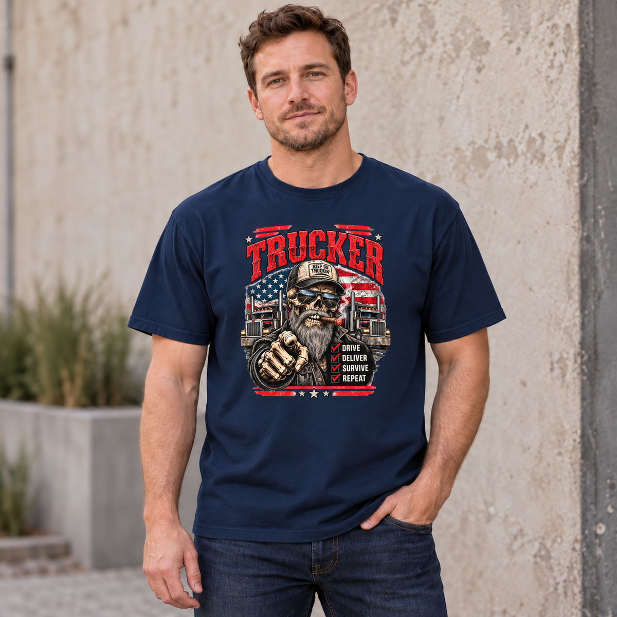AI lifestyle mockup of a male model wearing a True Navy Trucker Skull T-shirt with a bearded skeleton, two semi-trucks, American flag and Drive Deliver Survive Repeat checklist.